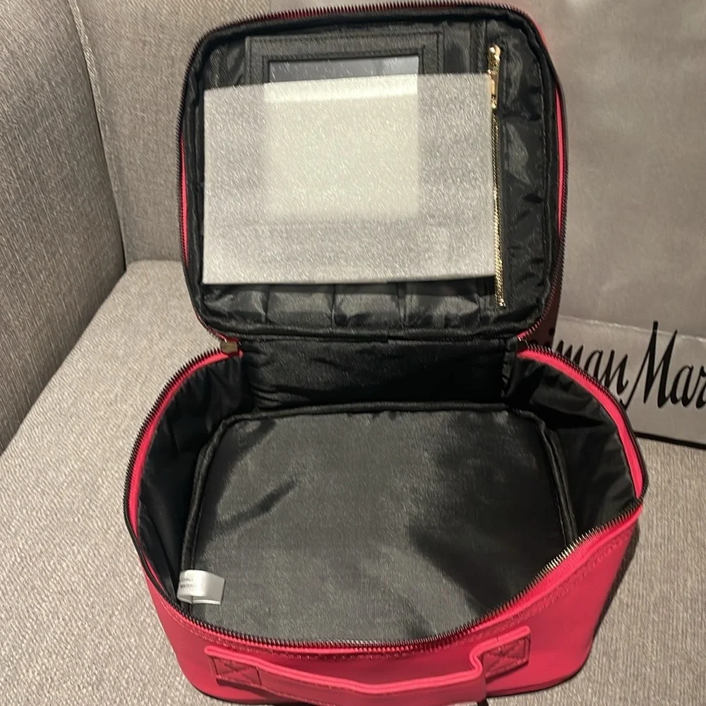 NWOT pink cosmetic case from Neiman Marcus